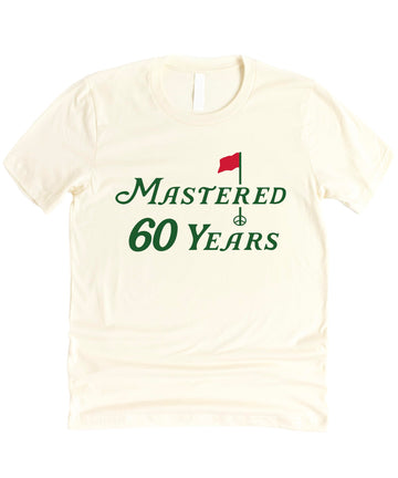 Close-up view of Mastered 60 Years 60th birthday golf shirt design with typography