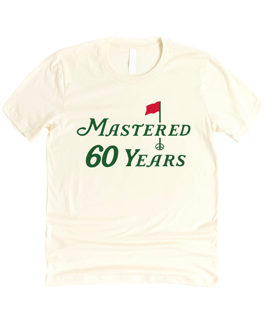 Close-up view of Mastered 60 Years 60th birthday golf shirt design with typography