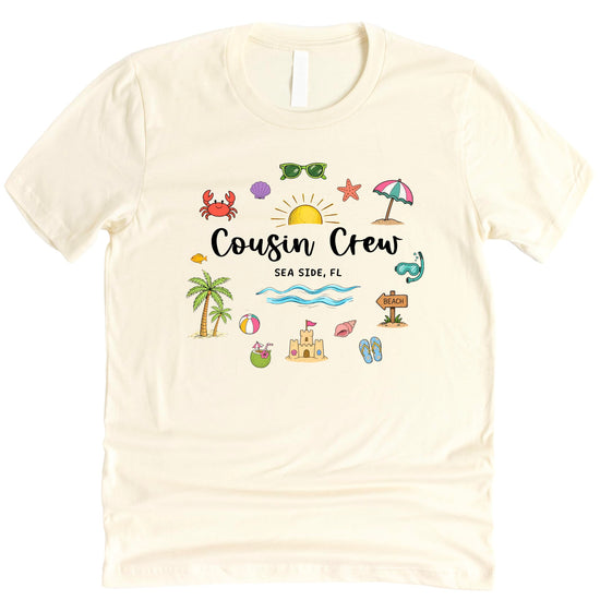 Close-up of hand-lettered Cousin Crew Sea Side FL design with beach ball and flip-flops