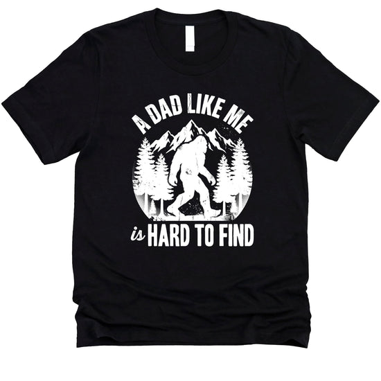 Black Bigfoot dad shirt with vintage Sasquatch silhouette and A Dad Like Me Hard to Find text