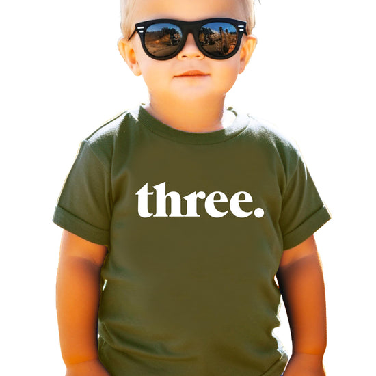 Toddler boy in Three period 3rd birthday shirt front view