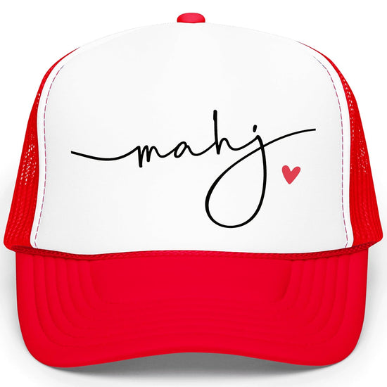 Product mockup showing mahj trucker hat design options in multiple colorway combinations