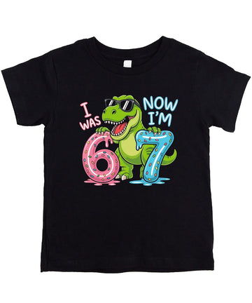 Pink I Was 6 Now I'm 7 dinosaur birthday shirt with T-Rex in sunglasses holding donut numbers