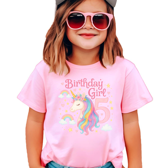 Girls wearing 5th birthday unicorn shirt showing fit and style on child model