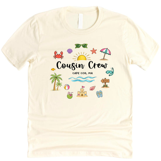 Close-up of Cousin Crew Cape Cod shirt design showing script lettering and beach icons including flip-flops and seashells