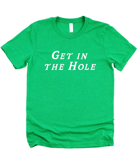 Get in the Hole golf shirt in natural color with bold script lettering across chest