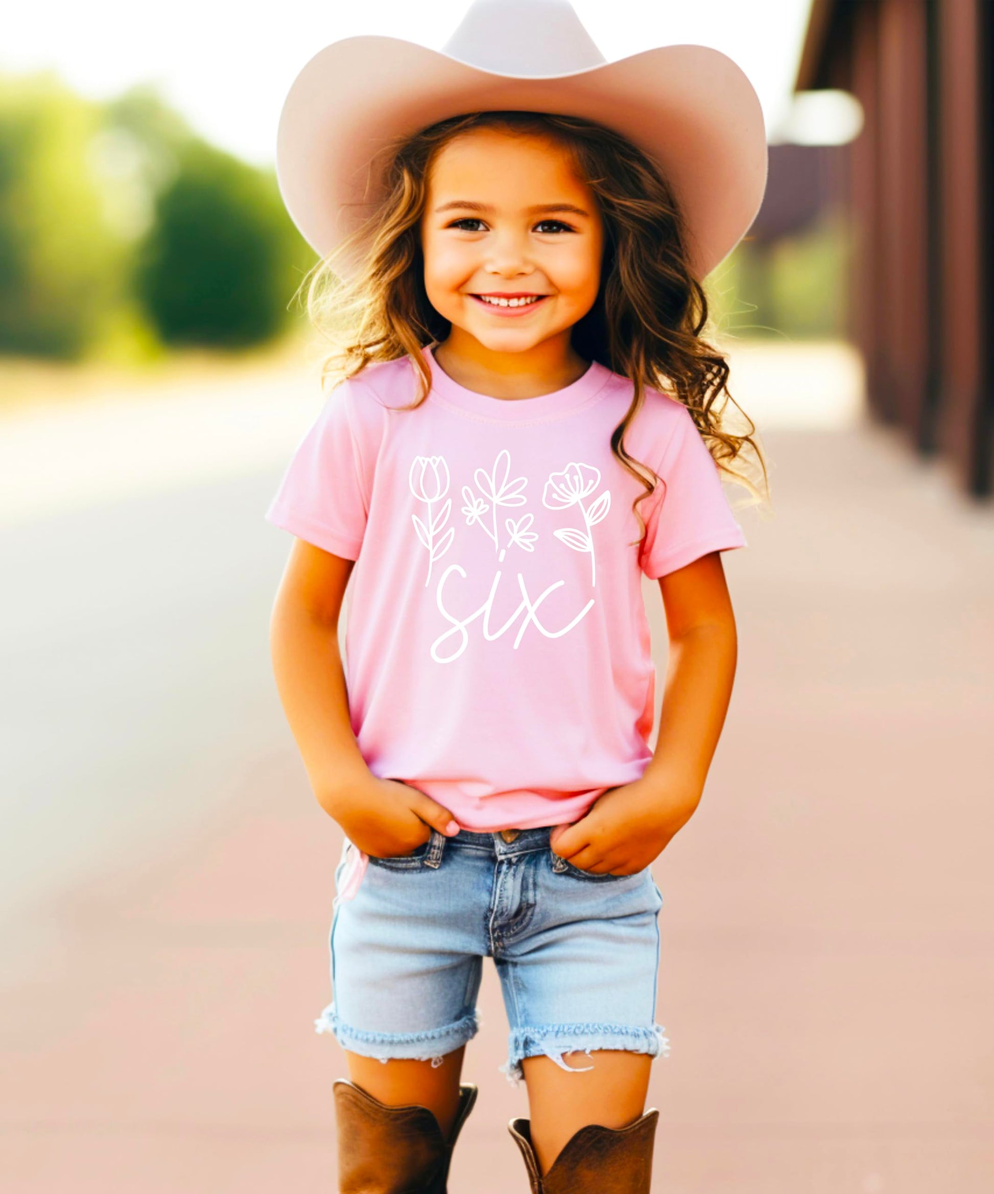 Back view of toddler girls birthday shirt showing fabric texture and fit