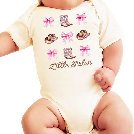 Baby bodysuit laid flat displaying full western-themed Little Sister graphic design