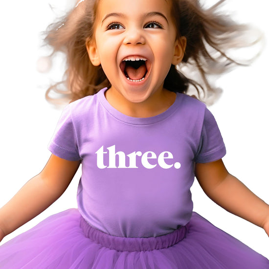 Three period birthday shirt flat lay showing minimalist design