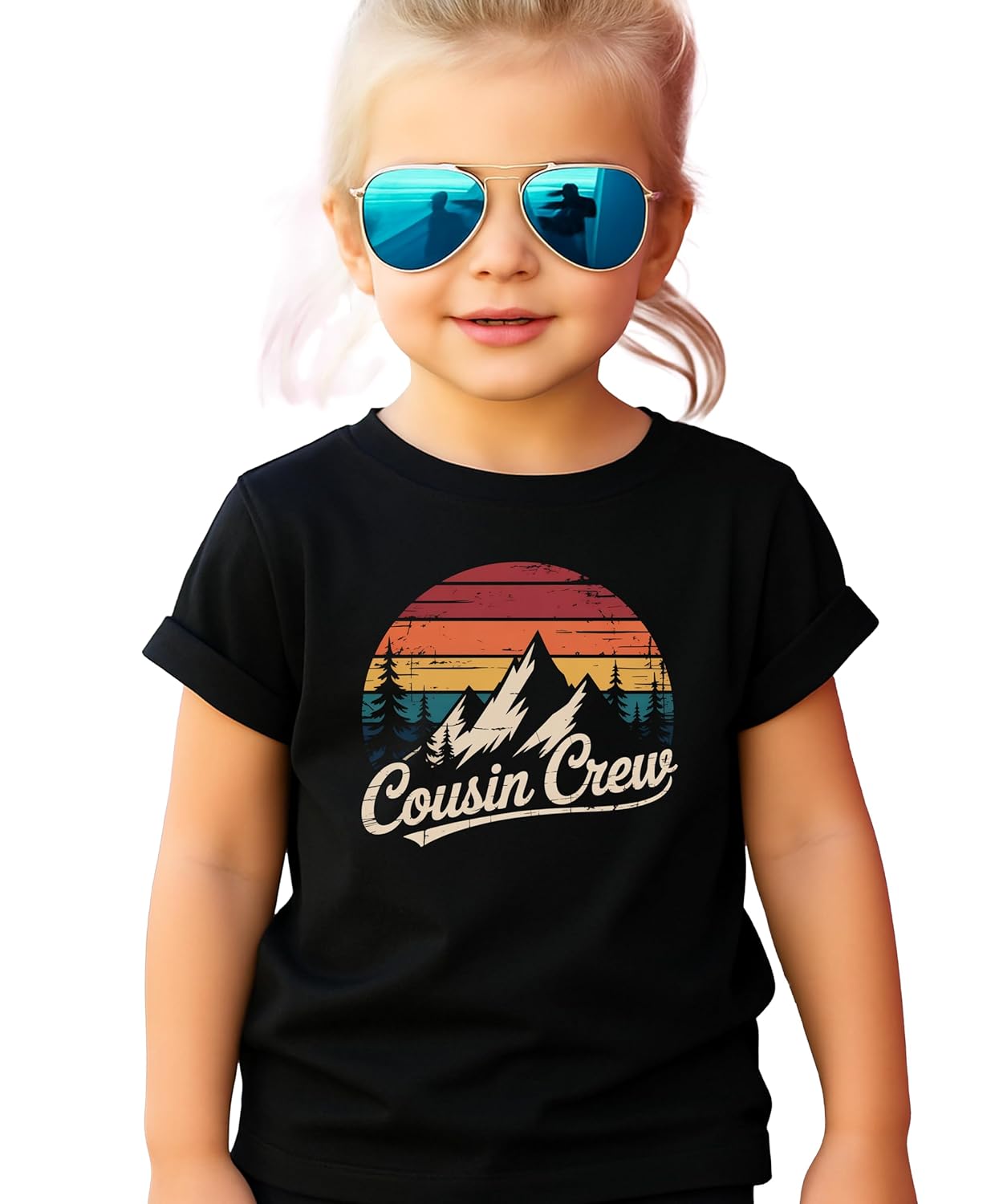 Cousin Crew shirt flat lay showing vintage mountain sunset graphic and script text