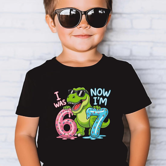 Kids dinosaur birthday shirt flat lay showing full T-Rex design and colorful lettering