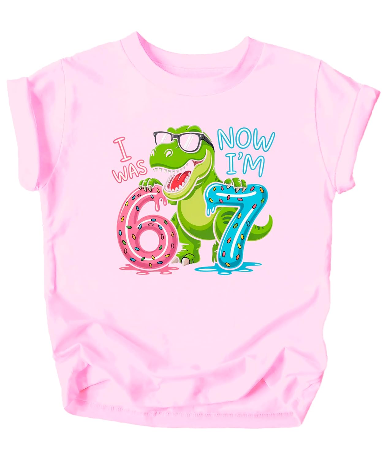 Close-up of I Was 6 Now I'm 7 shirt design showing dinosaur in sunglasses with donuts