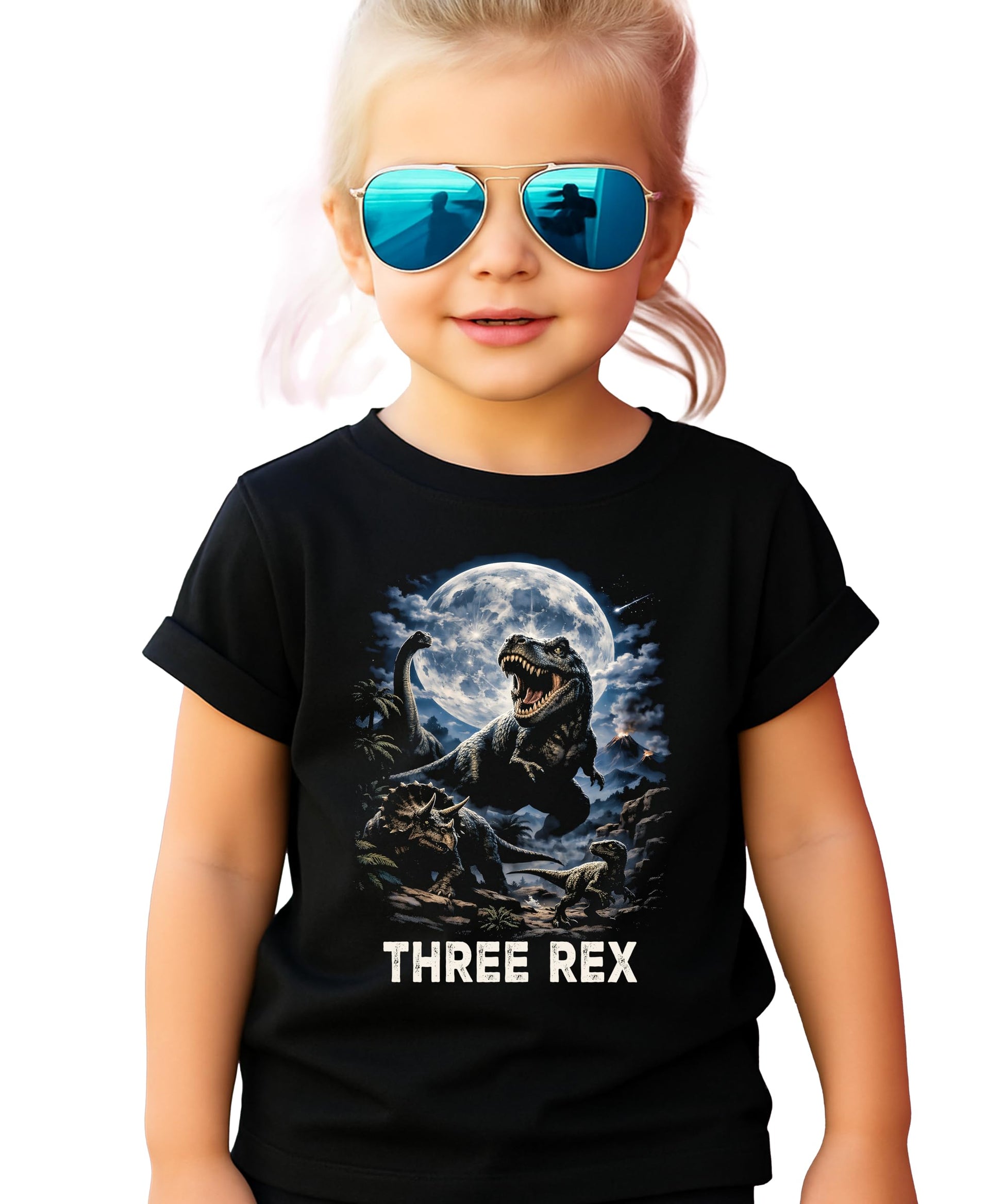 Toddler wearing black Three Rex 3rd birthday dinosaur shirt front view