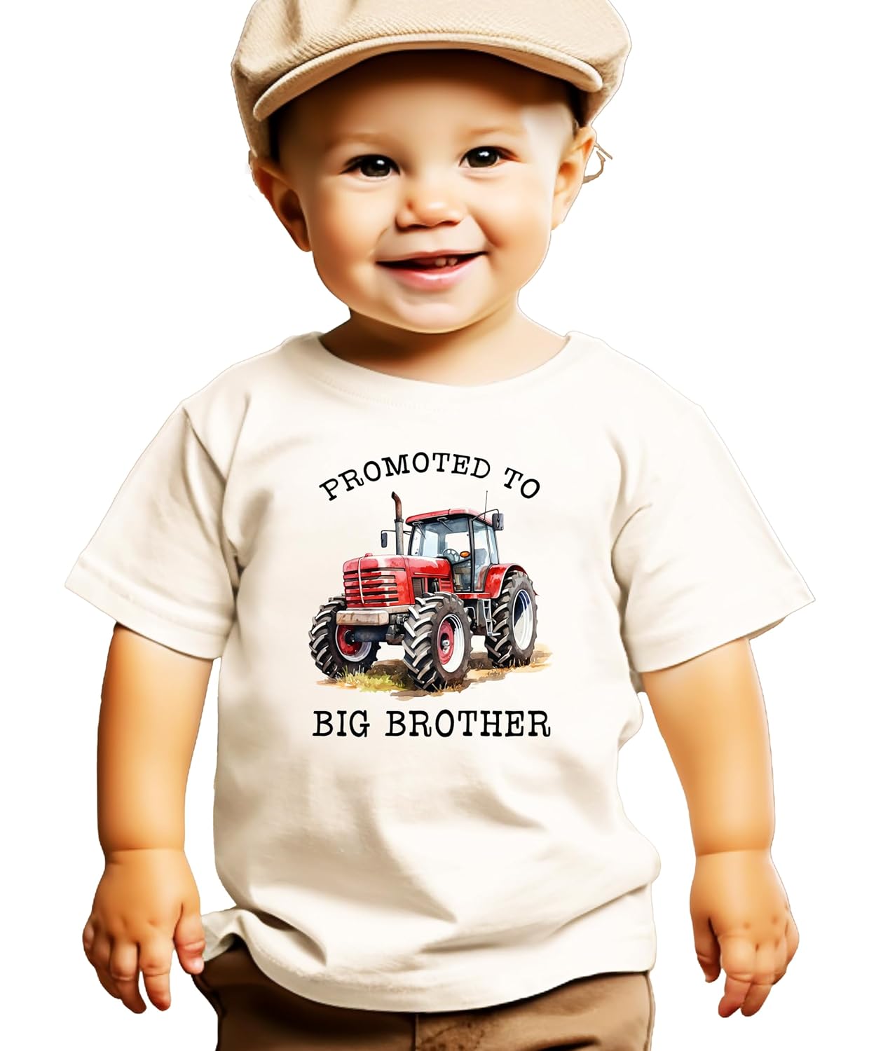 Close-up view of red tractor graphic with Promoted to Big Brother lettering on natural shirt
