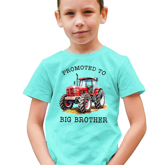 Natural colored boys tee with red tractor and Promoted to Big Brother text graphic