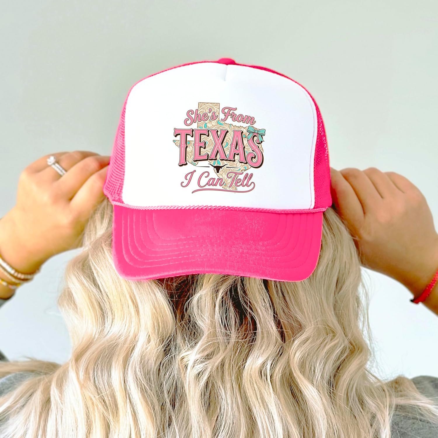 Flat lay of trucker hat showing full design and classic 5-panel construction