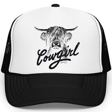Highland cow cowgirl trucker hat in white with black mesh back and script lettering