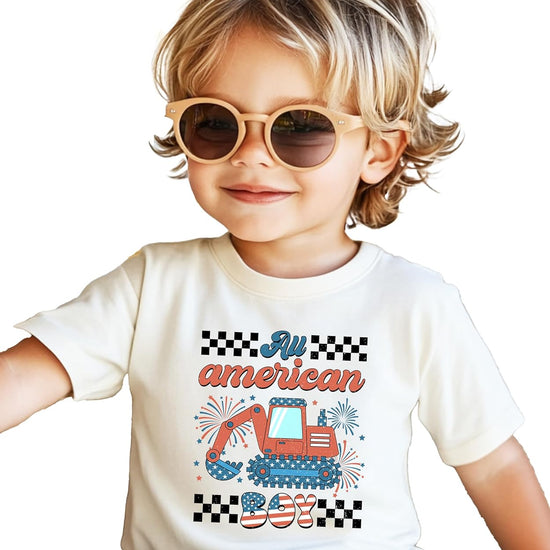 Flat lay styling of excavator graphic tee showing design details and fit