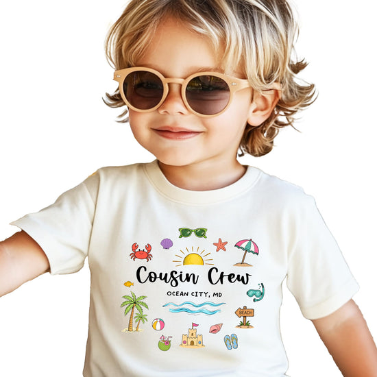 Cousin Crew Ocean City shirt layout showing colorful beach vacation design with palm trees