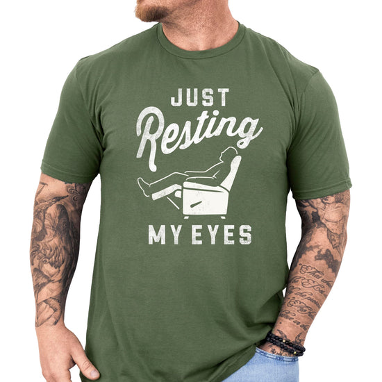 Model wearing Just Resting My Eyes Father's Day shirt showing comfortable fit and sizing