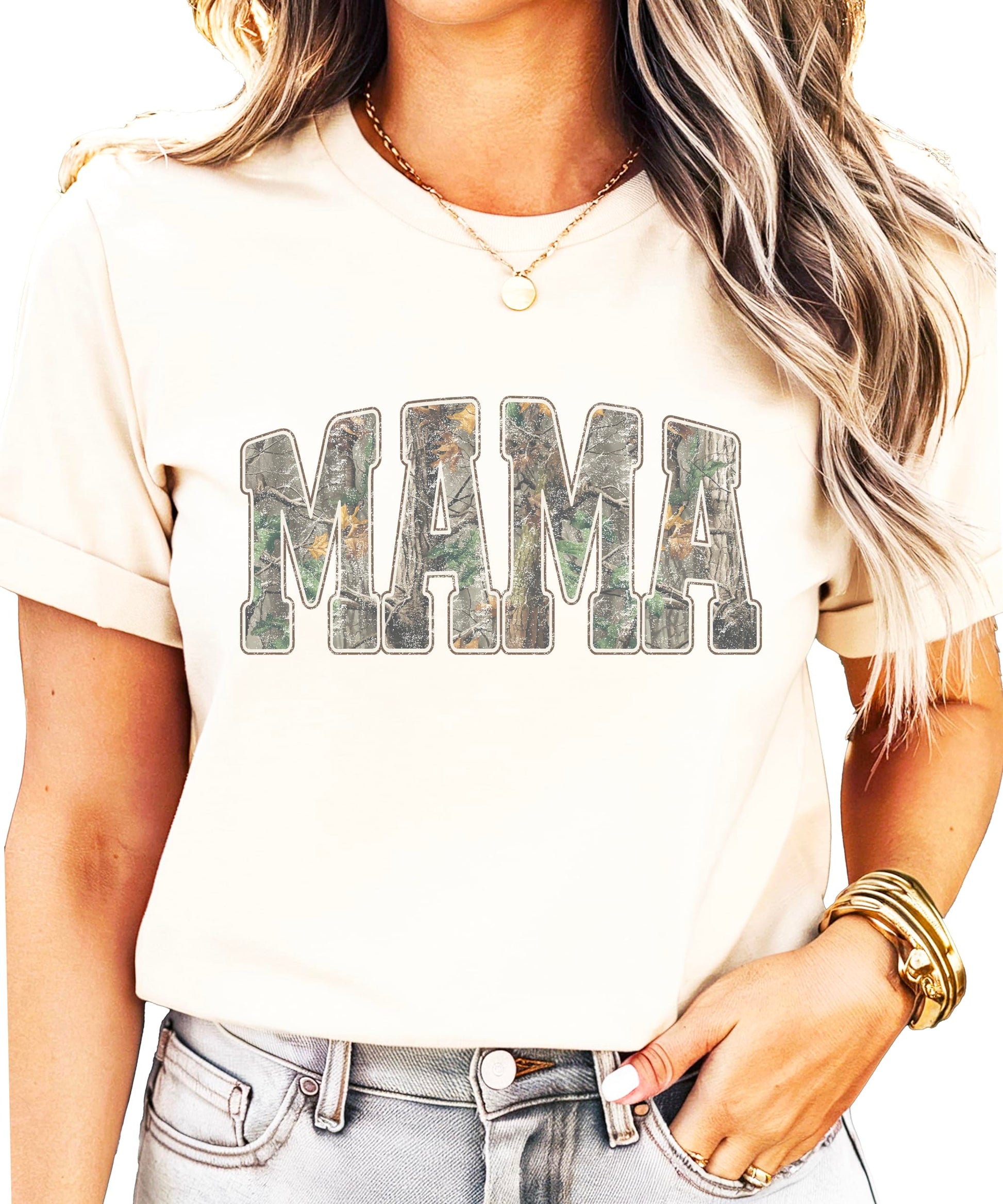 Flat lay of both mama and mini camo shirts arranged together showing matching design