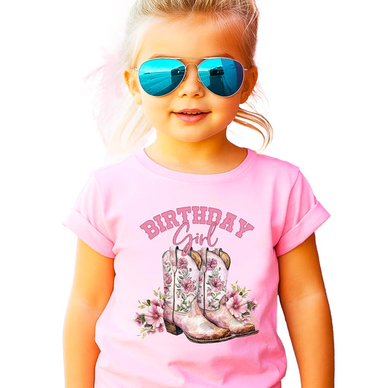 Birthday girl cowgirl tee displayed on hanger showing shirt color and graphic placement
