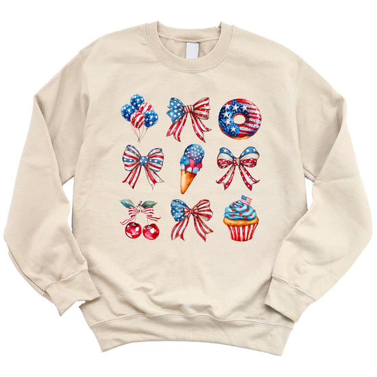 Patriotic sweatshirt design detail featuring star-spangled balloons patriotic bows cherries and flag-themed cupcake artwork