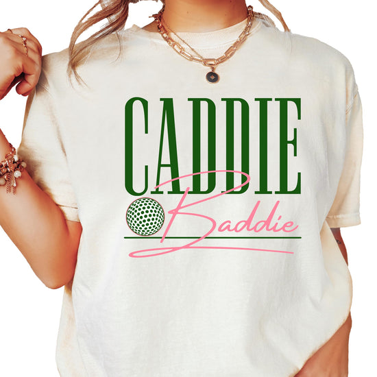 Women's Caddie Baddie golf shirt flat lay showing full design