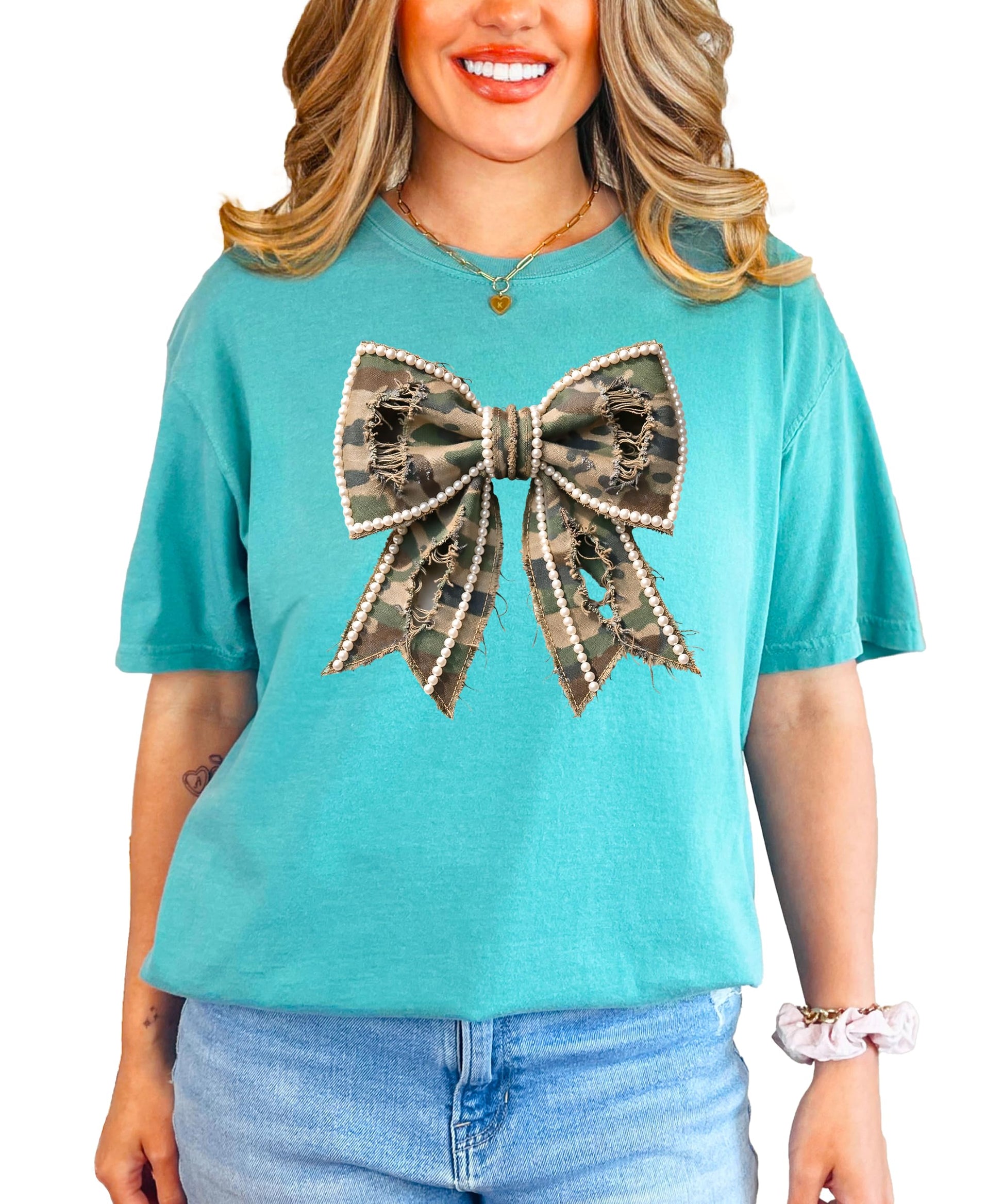 Full front view of women's blue denim shirt with camo pearls bow design