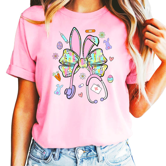 Easter nurse tee flat lay showing full shirt design with bunny and medical theme