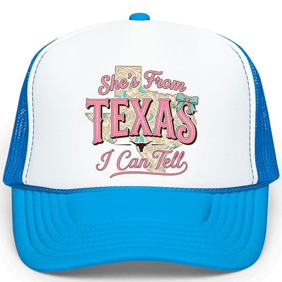 Close-up of She's From Texas design with pink lettering, turquoise accents and longhorn detail