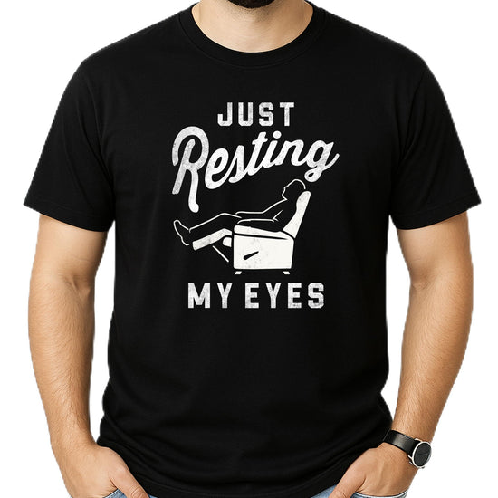 Just Resting My Eyes funny dad shirt with vintage recliner graphic design on black tee