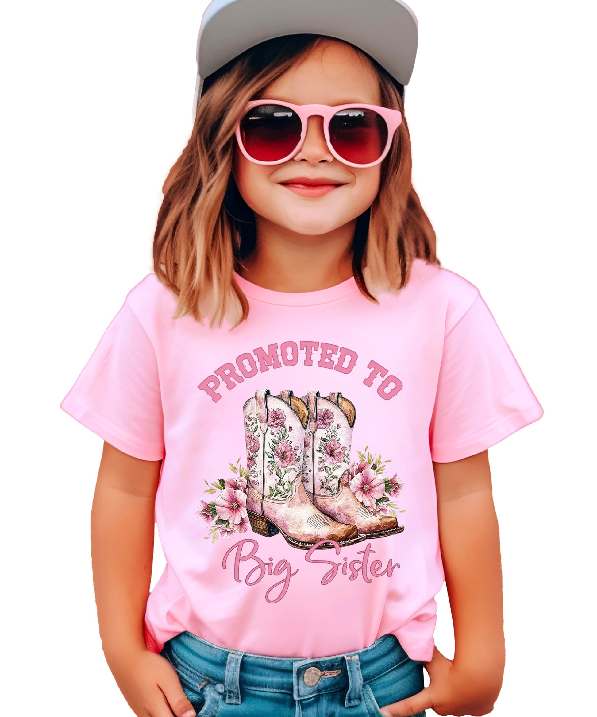 Close-up view of Big Sister shirt showing western cowgirl boots and flower graphics