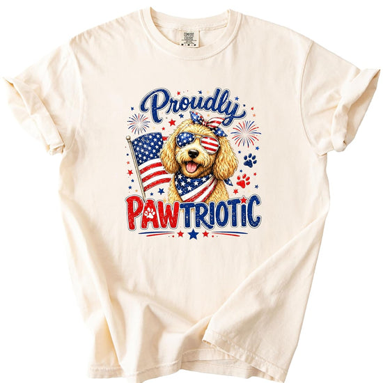 Woman wearing Proudly Pawtriotic doodle dog 4th of July graphic tee lifestyle photo