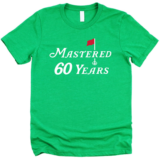 Vintage green Mastered 60 Years golf t-shirt with golf club graphics on front