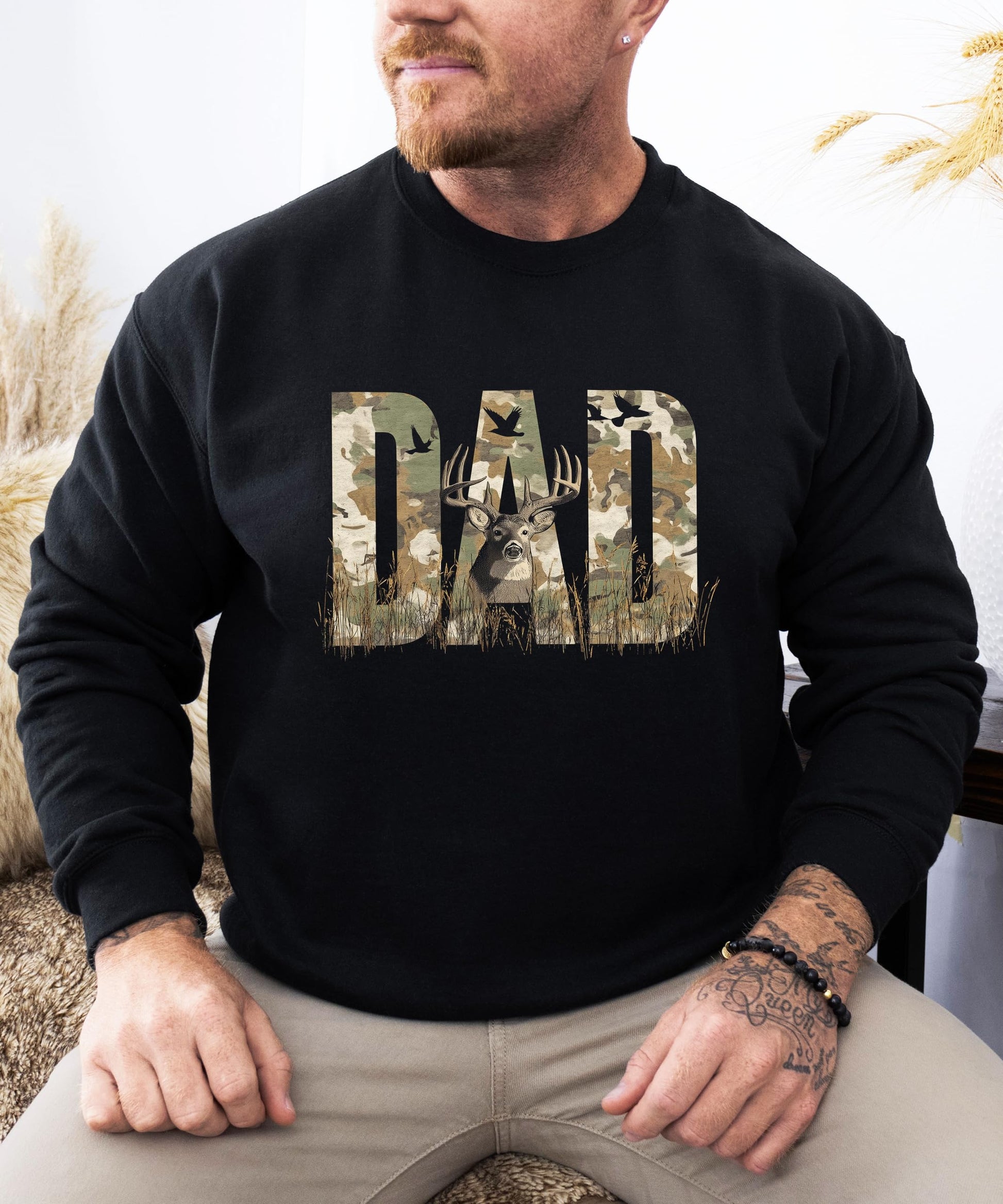 Detailed shot of hunting themed DAD graphic with camo fill and deer artwork