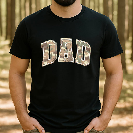 Detail shot of military-style camo DAD lettering on shirt