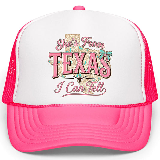 White trucker hat with pink She's From Texas script over tooled leather state silhouette design