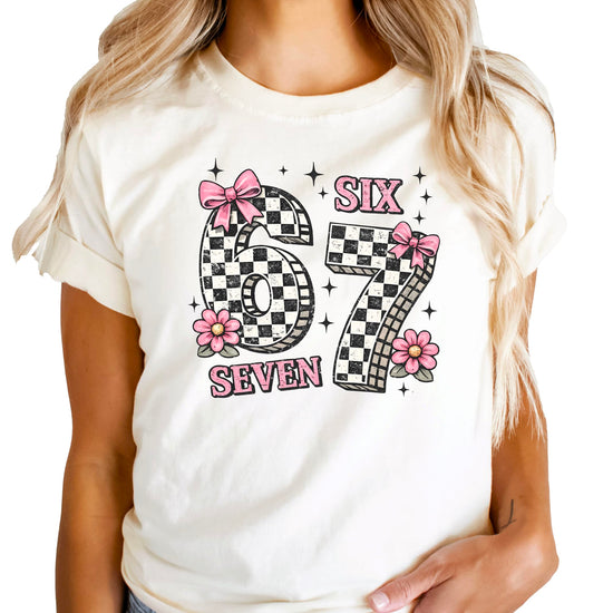 Birthday girl wearing Six Seven pink coquette style tee with bows and flowers