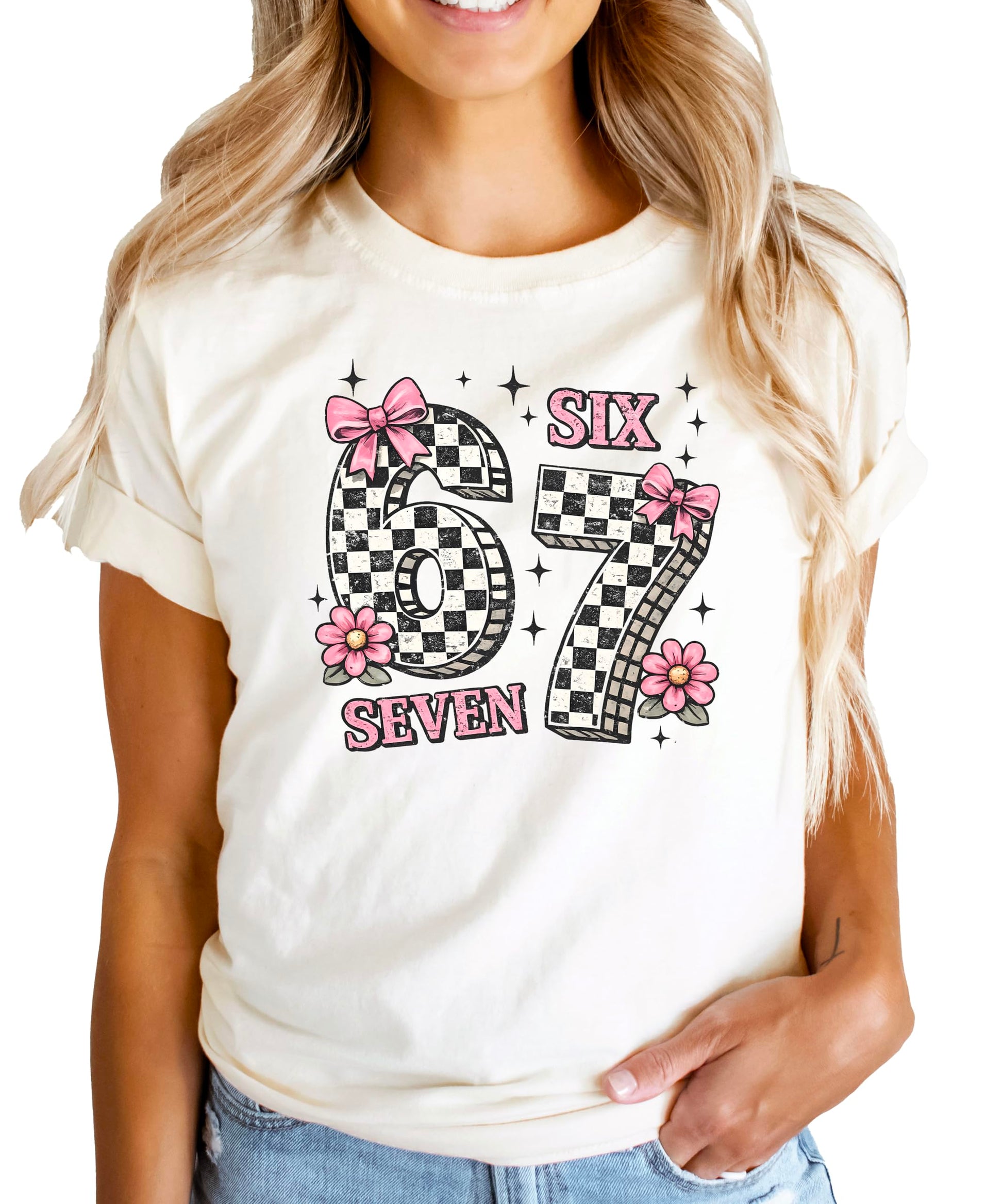 Birthday girl wearing Six Seven pink coquette style tee with bows and flowers