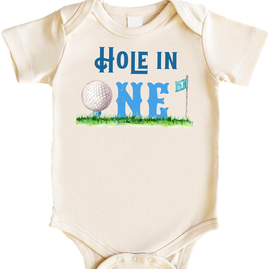 Side angle view of natural baby snap bodysuit with golf birthday graphic