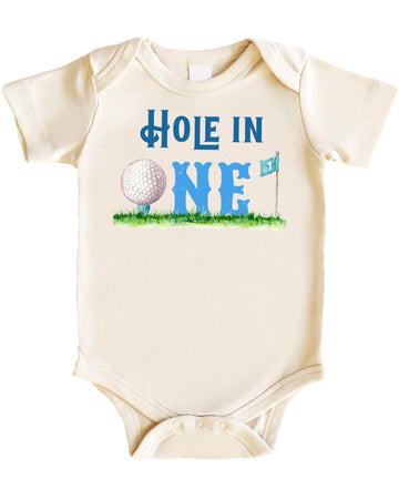 Side angle view of natural baby snap bodysuit with golf birthday graphic
