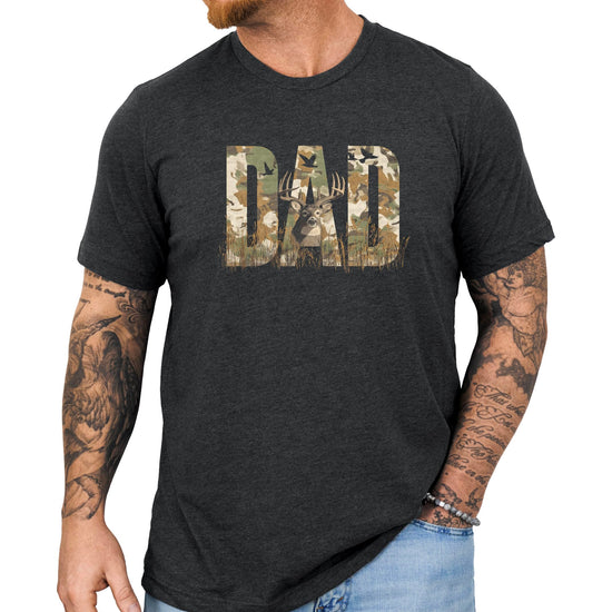 Flat lay of black DAD hunter shirt displaying full camo lettering and buck design