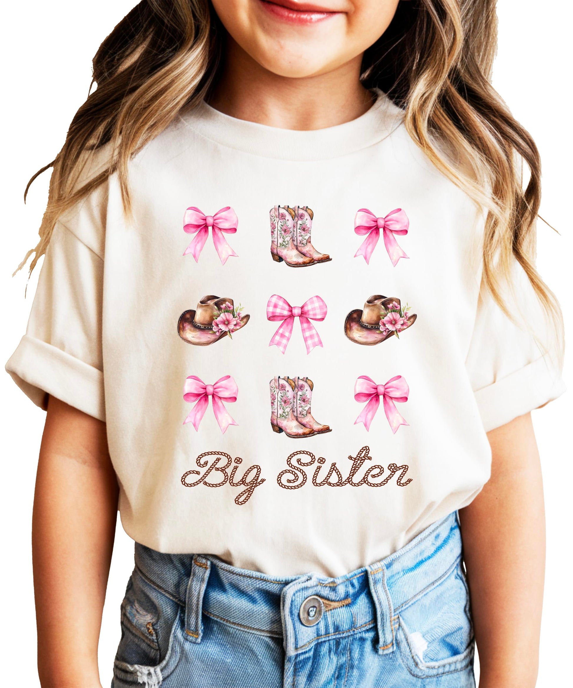 Big sister cowgirl shirt flat lay showing full western-themed sibling announcement design