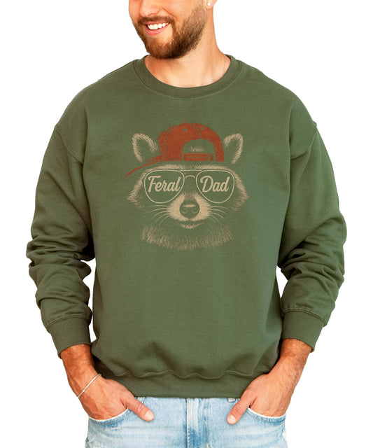 Close-up of Feral Dad raccoon design with sunglasses on black sweatshirt
