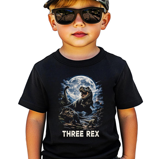 Close-up of Three Rex dinosaur birthday shirt showing detailed T-Rex print quality