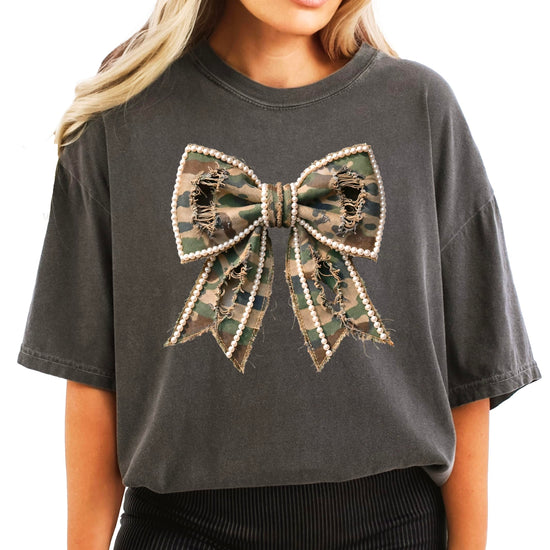 Side view of camo and pearls bow graphic shirt showing print detail