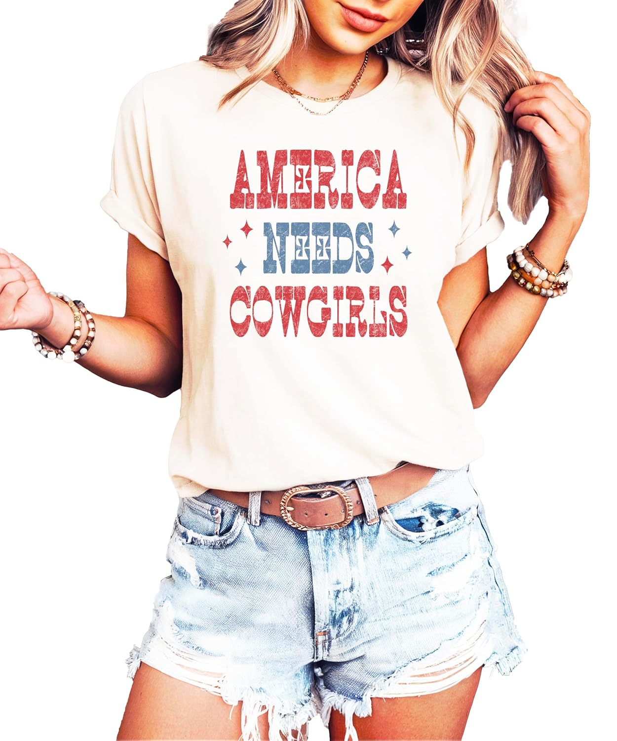 Woman wearing America Needs Cowgirls shirt with western style graphics