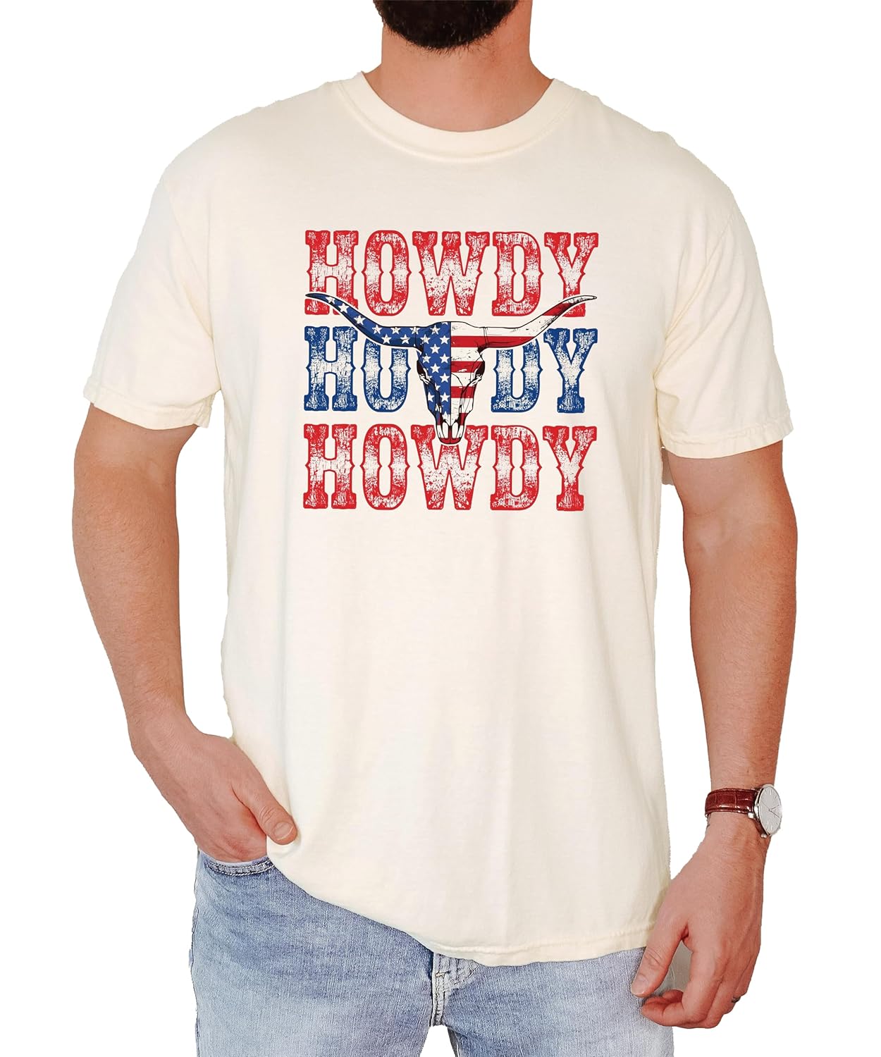 Close-up of distressed Howdy text and patriotic bull skull graphic on Western-style t-shirt