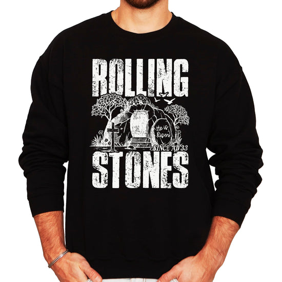 Close-up of He Is Risen Since AD 33 text and empty tomb graphic print on sweatshirt